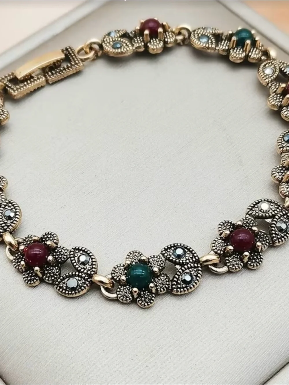 Vintage-Style Rose Gold Bracelet with Red and Green Beads
